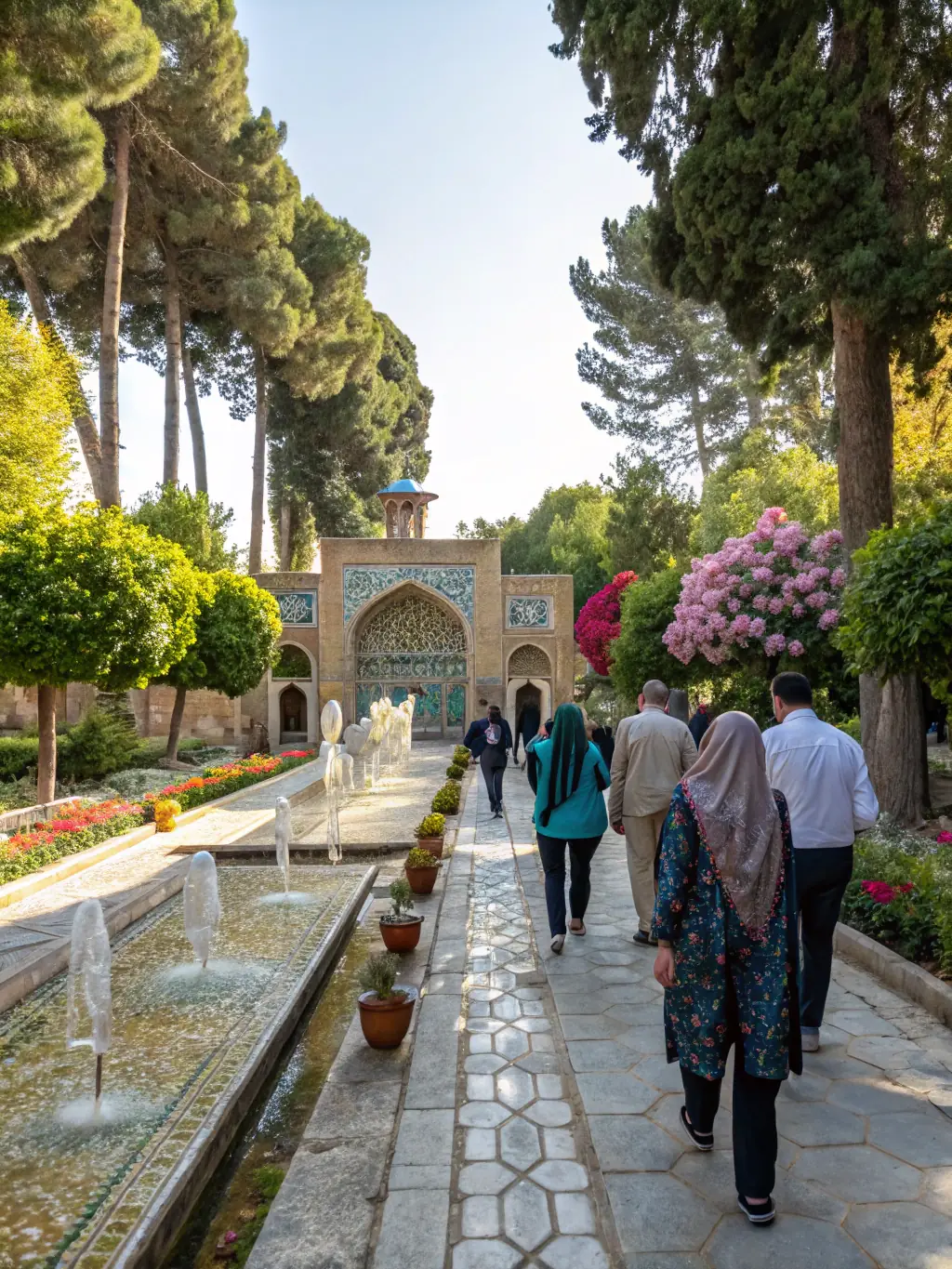 A photo of a guided tour group exploring the gardens and grounds of Lou Simbeu Baroncelli, listening to a knowledgeable guide share stories about the estate's history.